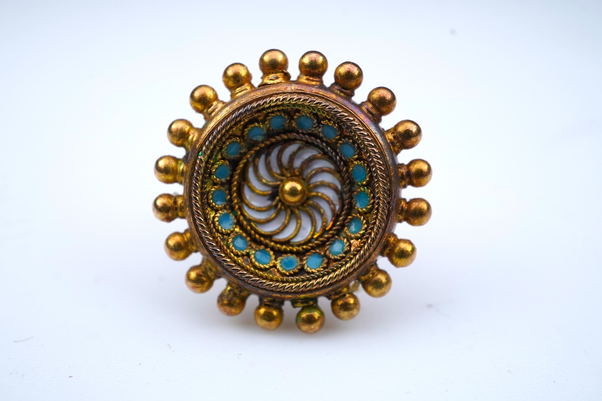 A gold, enamel and pearl pendant/brooch, mid 19th century, and a pair of earrings
